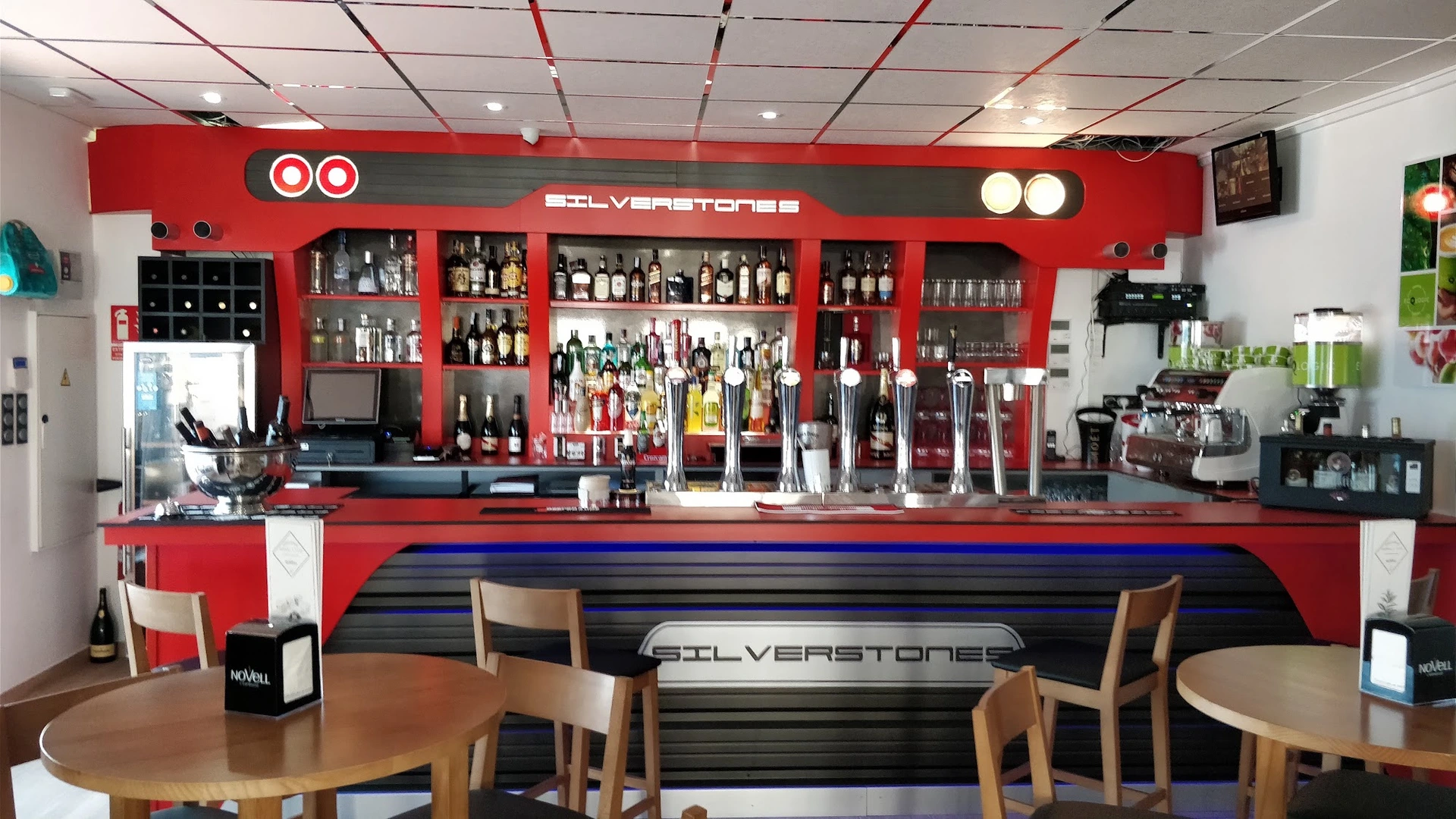 The Silverstones bar counter and back bar, fully stocked with spirits and beer taps